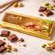 Молочный шоколад Lindt с цельными фисташками и миндалем 300 г - изображение 1