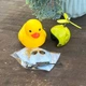 Автомобильная бешеная желтая уточка на панель приборов в очках и шлеме - изображение 2