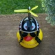Декоративный аксессуар Crazy Duck желтая утка на торпеду в авто с оружием в шлеме - изображение 5