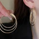 Сережки-кільця з блискучими вставками WeisGlam, золотисті - зображення 2