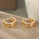 Серьги женские кольца с греческим орнаментом золотистые - изображение 2