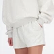 Жіночі бежеві шорти New Balance Sport Essentials French Terry 42 (XL) (WS41500AHH) - зображення 4
