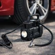 Компрессор автомобильный портативный от прикуривателя 12V Air Pump, компактный воздушный автокомпрессор насос с манометром и фонариком для накачки шин и надувных изделий Черный, APLX-125 - изображение 1