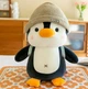 Мягкая плюшевая игрушка Пингвин с рюкзачком в серой шапке 25 см - изображение 1