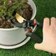 Профессиональный садовый секатор Pruner с лезвиями SK-5 и амортизатором для обрезки растений - изображение 5