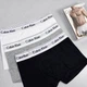 Набор трусов-боксеров Calvin Klein Underwear 3 шт М серый чёрный белый - изображение 1