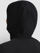 Спортивная ветровка с капюшоном женская Jack Wolfskin Mahani Jkt W A65748-6000 L Черная (4064886644563) - изображение 4
