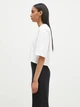 Футболка хлопковая короткая женская Adidas Originals Ess Crop Tee JJ3385 L White (4067902579726) - изображение 8
