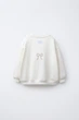 Світшот з блискучим містом Zara 5431/531 86см Бежевий (0543153180586) - изображение 2