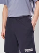 Шорты хлопковые короткие мужские Puma Essentials Graphics 69179016 L New Navy (4069161982248) - изображение 4