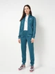 Спортивный костюм женский Puma Poly Suit Cl 69190441 S Emerald Ice (4069161385698) - изображение 1
