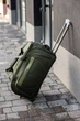 Сумка дорожня на колесах Wings Unlimeted 1106, середня (M) 61x33x32 см, 60 л оливкова - зображення 1