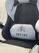Ігрове крісло INFINI ThrustX сіро-чорне з підставкою для ніг та подушками - зображення 10