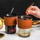 Стеклянный стакан для кофе Amber 400 мл со вставкой из кожи и трубочкой, темный - изображение 8