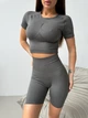 Спортивный женский костюм Hot с двойным пуш-ап и эффектом моделирования фигуры (кроп-топ футболка + удлиненные шорты) L Темно-серый (MS06_5024_5023L) - изображение 1