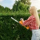 Аккумуляторные ножницы-кусторез Grant 24V 5Ah для травы и живой изгороди 2в1 с двумя насадками в кейсе - изображение 1