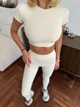 Спортивный женский костюм Hot с имитацией белья для фитнеса и йоги (кроп-топ футболка + леггинсы) c двойным Push Up Однотонный L Молочный (JB02_HOTL) - изображение 1