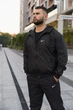 Чоловіча куртка-вітровка Windrunner Jacket захист від дощу та вітру зносостійка з вишитим логотипом та зручними кишенями чорна/S - зображення 4