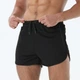 Короткие мужские спортивные шорты для бега, кроссфита и фитнеса 3448 XL Черный - изображение 2