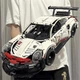 Конструктор Porsche Порше 911 GT3 RS з двигуном і пультом дистанційного керування 1580 дит Різнокольоровий (28577) - зображення 11