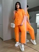 Жіночий костюм з сорочкою на ґудзиках та прямими брюками на резинці помаранчевий 50-52 - изображение 6