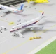 Колекційна лита металева модель пасажирського літака 1:300 Boeing 747 Malaysia Airlines 21 см - зображення 9