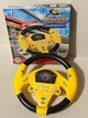 Развивающая детская игрушка WToys Руль музыкальный Сообразительный водитель желтый - изображение 1