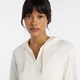 Жіноче біле худі New Balance Coastal Full Zip 36 (S) (WJ53508SST) - зображення 5