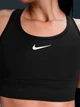 Спортивный топ для бега женский Nike Swoosh Pocket HF5360-010 L Черный (0197602796629) - изображение 5
