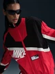 Спортивная ветровка для бега женская Nike Sportswear HJ0176-657 S Красная (0197602856224) - изображение 9