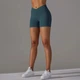 Спортивні жіночі короткі шорти Soft SQ з перехресним поясом та ефектом push up для фітнесу, йоги, танців Безшовні з утяжкою Однотонні L Темно-смарагдові (SQSH05L) - зображення 3