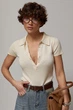 В'язана однотонна футболка - поло Lurex Бежевий One Size (95050) - зображення 5