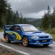 Колекційна модель Subaru Impreza WRX STI 1:32 синя металева машинка світло звук інерція відкривні елементи - зображення 5