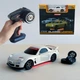 Дрифт машинка на радиоуправлении Mazda RX-7 Mini Drift 1:43, 4WD, до 15 км/ч, LED подсветка, USB зарядка, для дрифта (Белый) - изображение 1