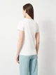 Футболка хлопковая женская Puma Graphics Logo Tee 69191002 XS White (4069161675065) - изображение 2
