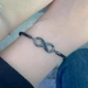 Браслет бесконечность со стразами черный женский на шнурке стильный браслет символ любви и связи - изображение 10
