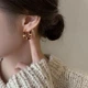 Серьги кольца текстурные 2х2 см золотистые - изображение 2