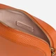 Torebka crossbody damska skórzana Coccinelle E5MN555I101-R41 Jasnopomarańczowa (800070354228) - obraz 4