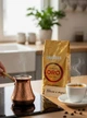 Итальянский натуральный зерновой кофе Lavazza Qualita Oro 1000g 100% Арабика 1Кг дегазационный клапан зерна Лавацца для турки кофемашины гейзерной кофеварки дома офиса в зернах средняя степень обжарки насыщенный аромат 1Kg Gold - изображение 5