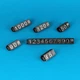 Набор пластиковых ценников с цифрами Lesko XL 100 шт 10×15 мм черный с серебряными цифрами для товаров на витрину - изображение 1