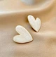 Жіночі сережки "Серденька" 3х4 см jewelry Білі - зображення 1