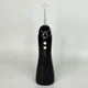 Іригатор для ротової порожнини 200 мл бездротовий акумуляторний Oral Irrigator, портативний з 3 режимами роботи і 4 змінними насадками для догляду за зубами, яснами та брекетами Чорний, RGL-137-Black - зображення 2