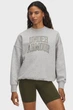 Жіночий світло-сірий світшот Rival Flc OS Varsity Crew Under Armour M 6007880-014 - изображение 1