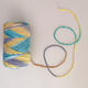 Шпагат градієнт YarnArt twisted macrame 3mm VR 250г жовтий смарагд (924) - изображение 1