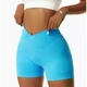 Спортивные женские короткие шорты Soft SQ с перекрестным поясом и эффектом push up для фитнеса, йоги, танцев Бесшовные с утяжкой Однотонные L Ярко-голубые (SQSH08L) - изображение 13