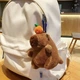 Брелок плюшевая капибара с мандаринкой 12 см хомяк мягкая игрушка capybara крутящимся механическим хвостом - изображение 5