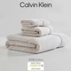 Calvin Klein махровые полотенца из плотного однотонного 100% хлопка с брендированным кантом (3 штуки – комплект для одного) – бежевый - изображение 2