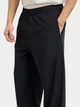 Штани із плащівки на затяжках Armani Exchange 31 чорний XM002085 - зображення 4
