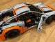Машинка конструктор на пульті керування+підсвітка Porsche 911 блакитний+помаранчевий, масштаб 1:14 - изображение 6
