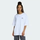 Жіноча футболка SOFT SIDE OVERSIZED GRAPHIC adidas KA5091 (XS) білий (4068814068544) - зображення 1